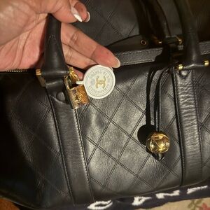 Chic Black Quilted Leather Travel Bag